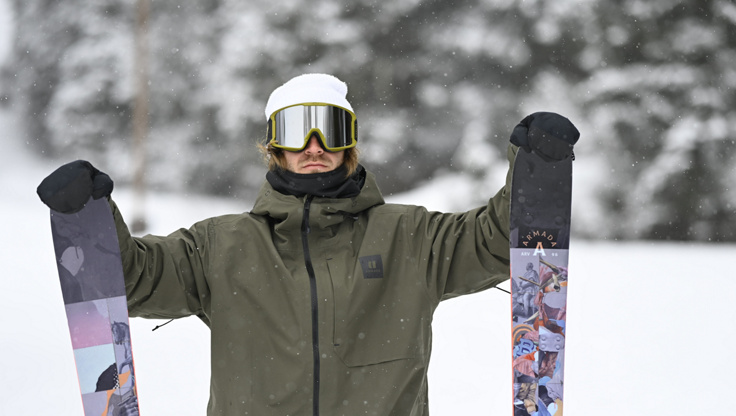 Model with a pair of freestyle freeskis