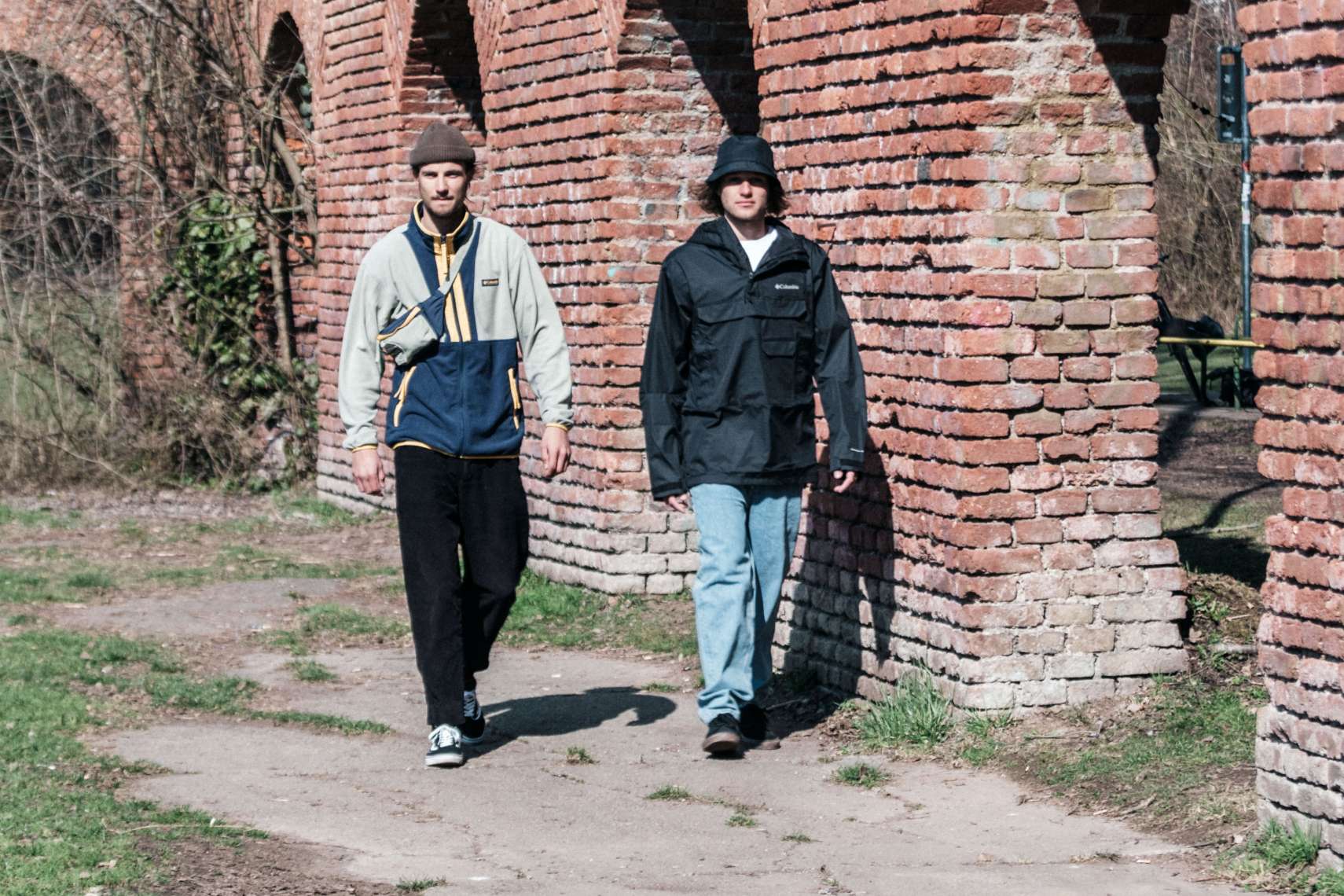 Two guys exploring the urban in the Back Bowl Lightweight sweatjacket and the Buckhollow jackets