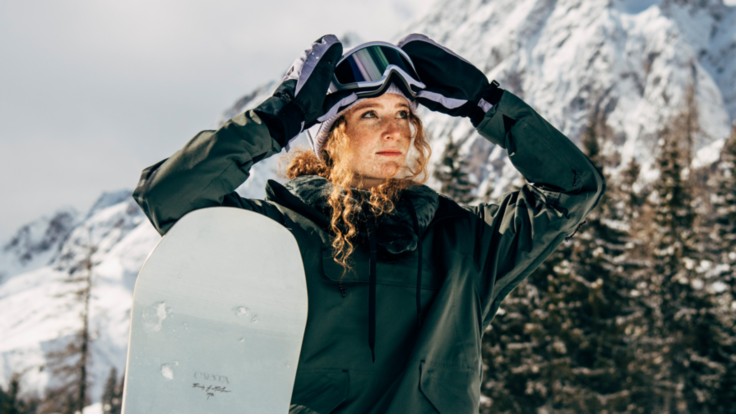 model wearing a small snowboard goggle