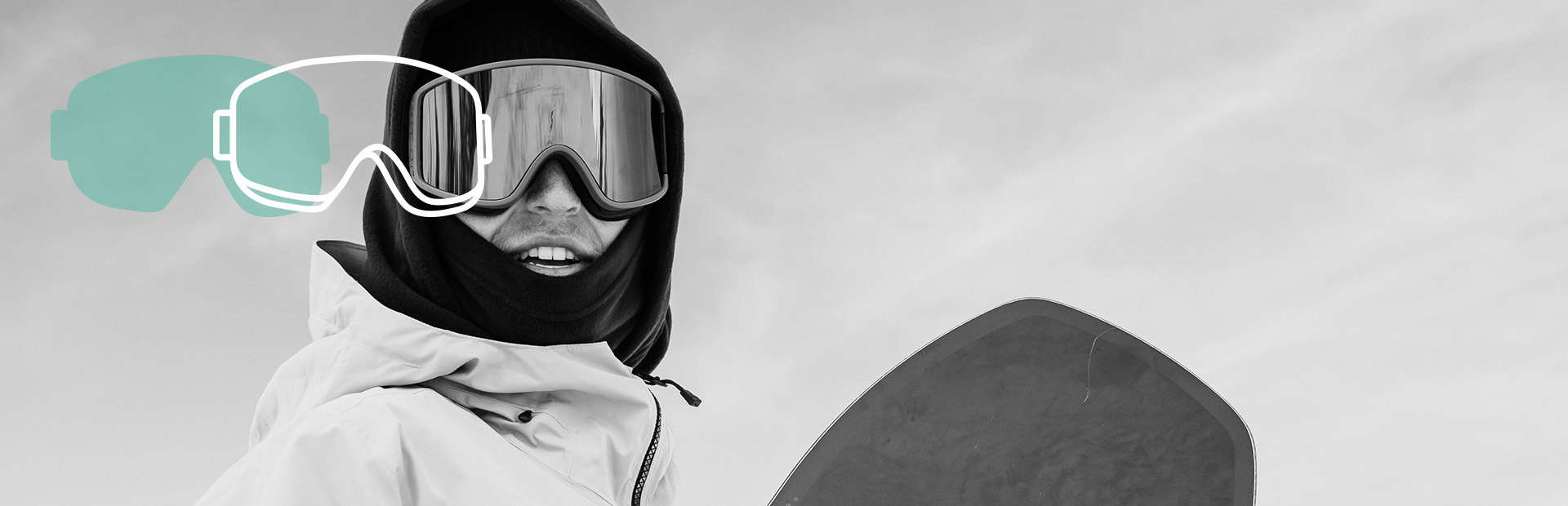 A spheric mirrored snowboard goggle closeup