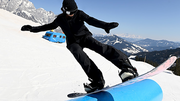 Michael Mayer pressing a tail slide in Nordekette Innsbruck with soft boots